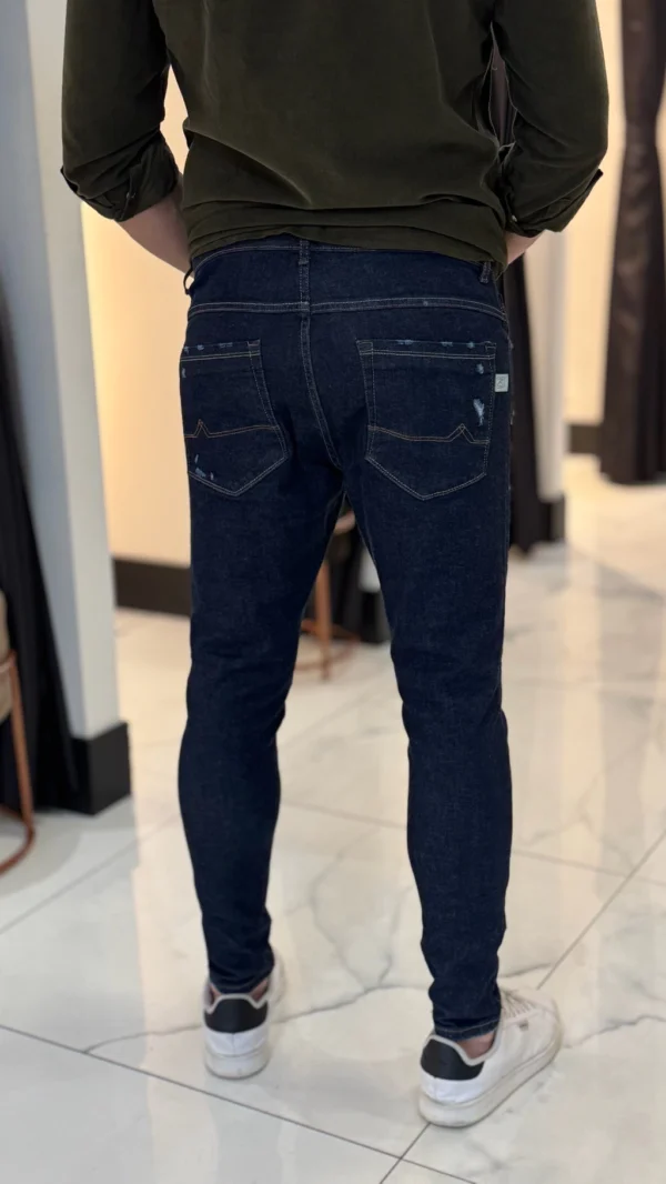 img_2222-be183b0fe7ddc27bad17449108773658-1024-1024 Calça Jeans Skinny com Puídos Ref. 22237